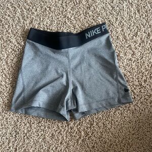 nike. size small. gray spandex